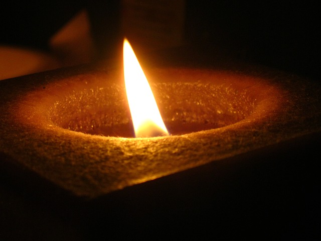 A candle shining in the dark